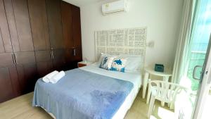 Postel nebo postele na pokoji v ubytování Magico Apartamento Frente al Mar 3 Habitaciones MSC64