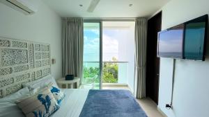 Postel nebo postele na pokoji v ubytování Magico Apartamento Frente al Mar 3 Habitaciones MSC64