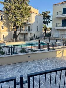 a swimming pool in the middle of a building at Lulu Lustica bay in Tivat