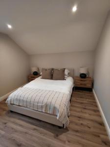 Ένα ή περισσότερα κρεβάτια σε δωμάτιο στο Macaldrack's Loft