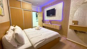 Ένα ή περισσότερα κρεβάτια σε δωμάτιο στο 1min walk B&B City Center