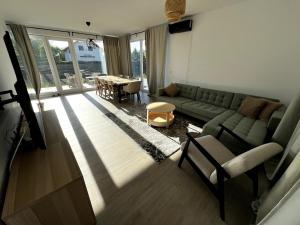 Posezení v ubytování Tâmpa Cozy Hideaway