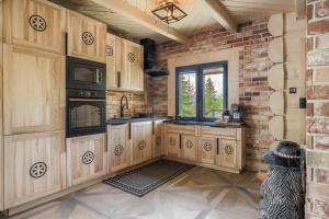 Η κουζίνα ή μικρή κουζίνα στο Chatka Niedźwiadka