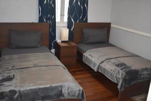 Postel nebo postele na pokoji v ubytování Villa Blue Vue