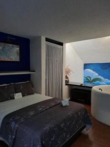 Postel nebo postele na pokoji v ubytování Hotel Villas Las Anclas + 25 fotografií