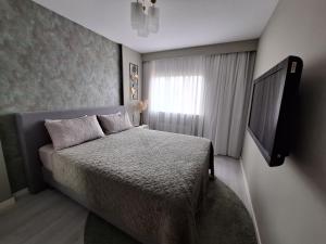 Postel nebo postele na pokoji v ubytování Cozy Nest