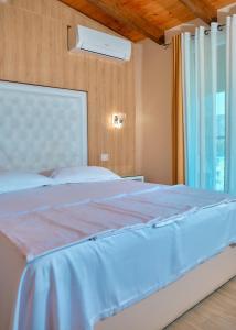 Giường trong phòng chung tại Hotel Center Park