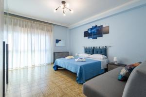 Ένα ή περισσότερα κρεβάτια σε δωμάτιο στο Sole e Luna Apartment