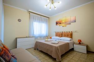 Ένα ή περισσότερα κρεβάτια σε δωμάτιο στο Sole e Luna Apartment +22 φωτογραφίες