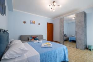 Ένα ή περισσότερα κρεβάτια σε δωμάτιο στο Sole e Luna Apartment