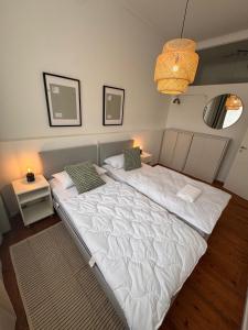 Postel nebo postele na pokoji v ubytování Bavaria Home Apartments Geisenfeld