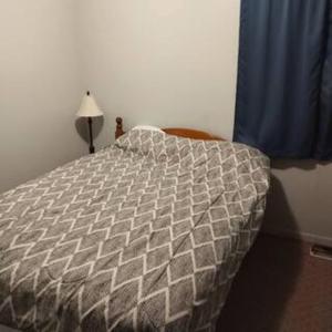 Ένα ή περισσότερα κρεβάτια σε δωμάτιο στο Loft
