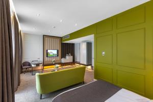 TV a/nebo společenská místnost v ubytování Ivy Garden Hotel Baku