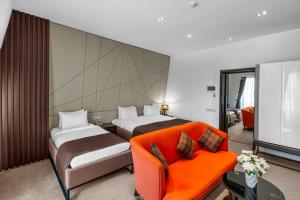 Postel nebo postele na pokoji v ubytování Ivy Garden Hotel Baku