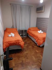 Ένα ή περισσότερα κρεβάτια σε δωμάτιο στο HOSTEL KUYUK