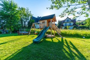Detský kútik v ubytovaní Apartamenty z widokiem & Basen - Willa KRÓLE 25A by RentiloPL