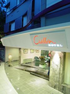 a building with a sign that reads cullier at Hotel Crillon Mendoza in Mendoza