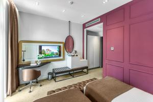 Postel nebo postele na pokoji v ubytování Ivy Garden Hotel Baku