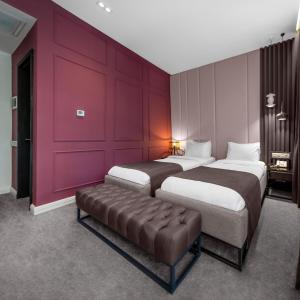 Postel nebo postele na pokoji v ubytování Ivy Garden Hotel Baku