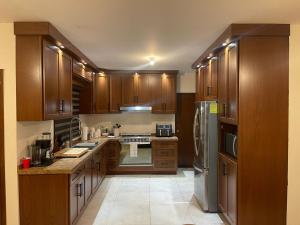 Kuchyň nebo kuchyňský kout v ubytování Casa en zona exlusiva al norte de la ciudad