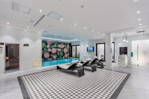 TV a/nebo společenská místnost v ubytování Ivy Garden Hotel Baku
