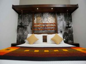 Llit o llits en una habitació de Serendib Signature Resort