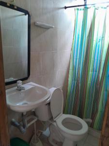 Koupelna v ubytování casa xiomy + 4 fotografie