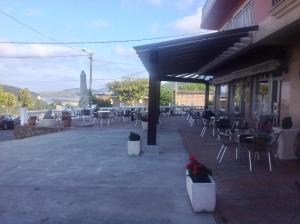 A restaurant or other place to eat at Albergue As Eiras