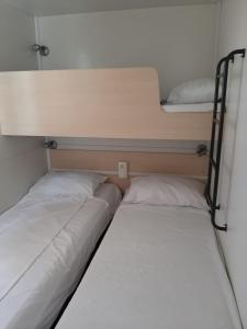 Giường trong phòng chung tại Apartments with swimming pool Pakovo Selo, Zagora - 24486 +9 ảnh