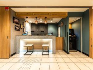 Kuchyň nebo kuchyňský kout v ubytování Super Hotel JR Shin-Osaka Higashiguchi