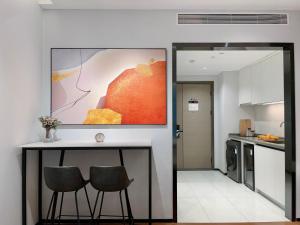 Shenzhen Shatoujiao Subway Station Apartment Hotel廚房或簡易廚房