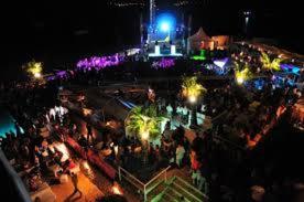 a crowd of people at an event at night at Apartment Ruby in Mandre +48 photos