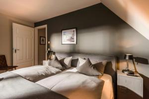 Voodi või voodid majutusasutuse Luxury Apartment With Lagoon View In Loddin toas