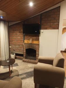 Posezení v ubytování Sumaq Sisa Home & Loft