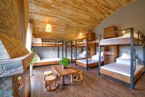 a room with a bunch of bunk beds at SAPA HUB hostel in Sa Pa