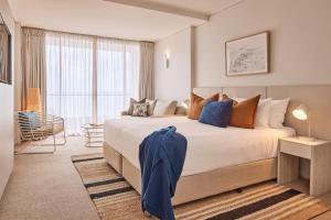 Rydges Cronulla Beachside客房内的一张或多张床位