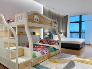 Shenzhen Shatoujiao Subway Station Apartment Hotel房間的床