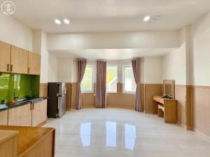 Kuchyň nebo kuchyňský kout v ubytování Nova Hotel Vũng Tàu