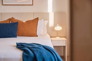 Rydges Cronulla Beachside客房内的一张或多张床位