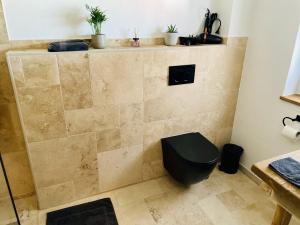 Ένα μπάνιο στο Ferienwohnung Ziegelgarten