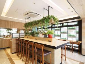 Kuchyň nebo kuchyňský kout v ubytování Super Hotel Umeda Higobashi