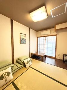 天下茶屋 三好吉房客房内的一张或多张床位