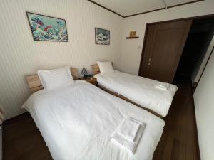 天下茶屋 三好吉房客房内的一张或多张床位