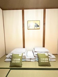 天下茶屋 三好吉房客房内的一张或多张床位