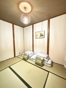 天下茶屋 三好吉房客房内的一张或多张床位