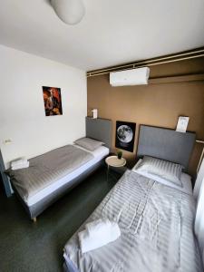 Postel nebo postele na pokoji v ubytování Hostel POINT + 10 fotografií