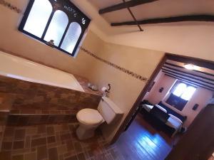 Koupelna v ubytování Hotel Pueblo Dorado Sesquilé