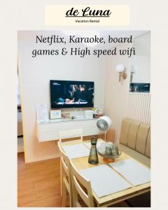 a magazine cover of a living room with a table and a tv at de Luna Vacation Rental in Davao City