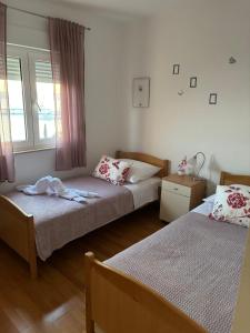 Postel nebo postele na pokoji v ubytování Apartment Marijana