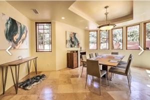 a dining room with a table and chairs at Sedona Chapel View Villa in Sedona